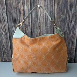 Dooney & Bourke hobo bag with a signature monogram pattern